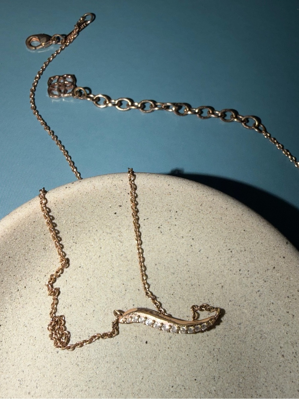 Kendra Scott Rose Gold Curved Bar Necklace with Clear Crystals